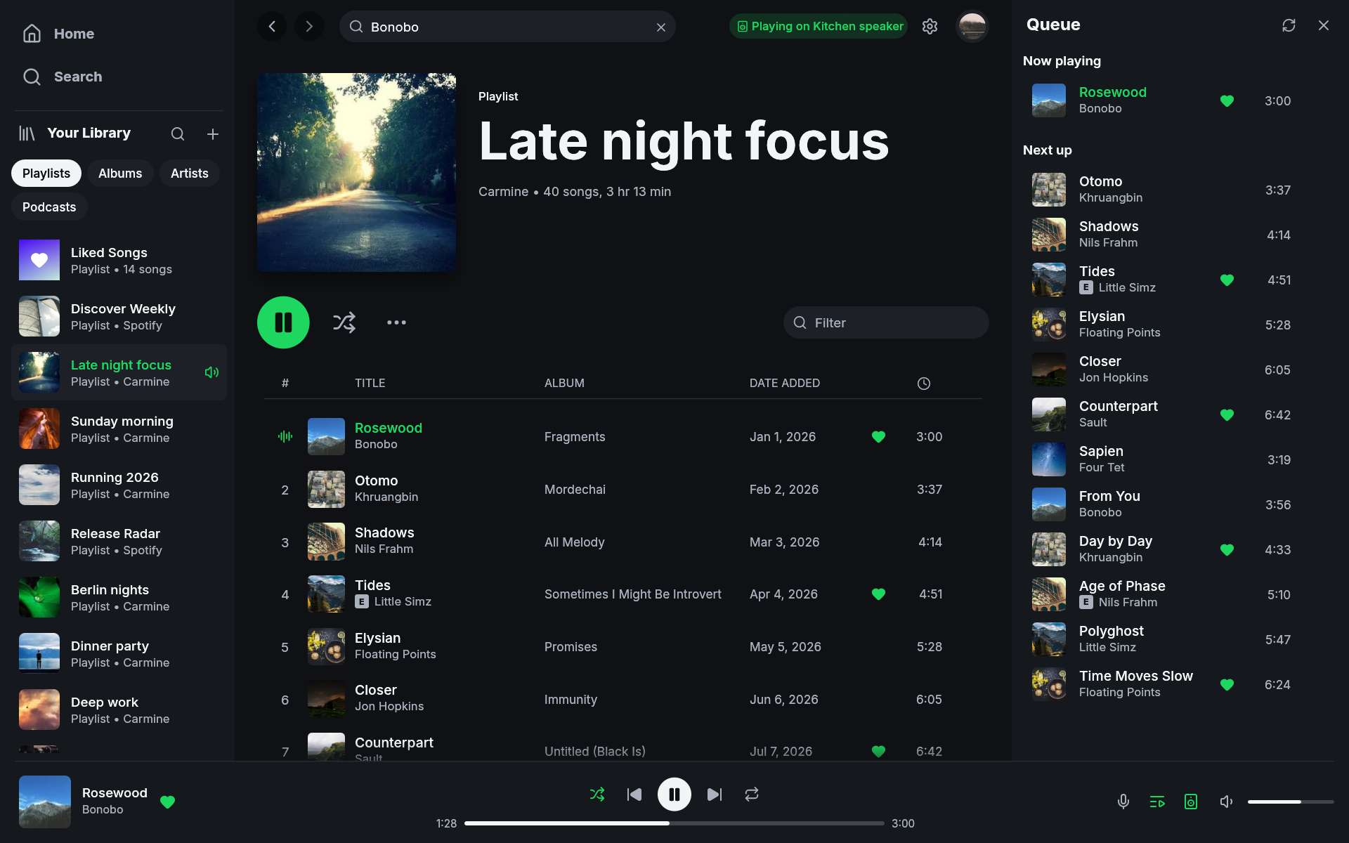 Woofer showing a playlist with the queue open and a track playing